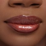 <strong class=aaaaa>Buzzin' About</strong><br/><span class=bbbbb>Toy Story Ultra Glossy Lip</span><br/><b class=ccccc>Hydrating Lip Gloss</b> - Image 3